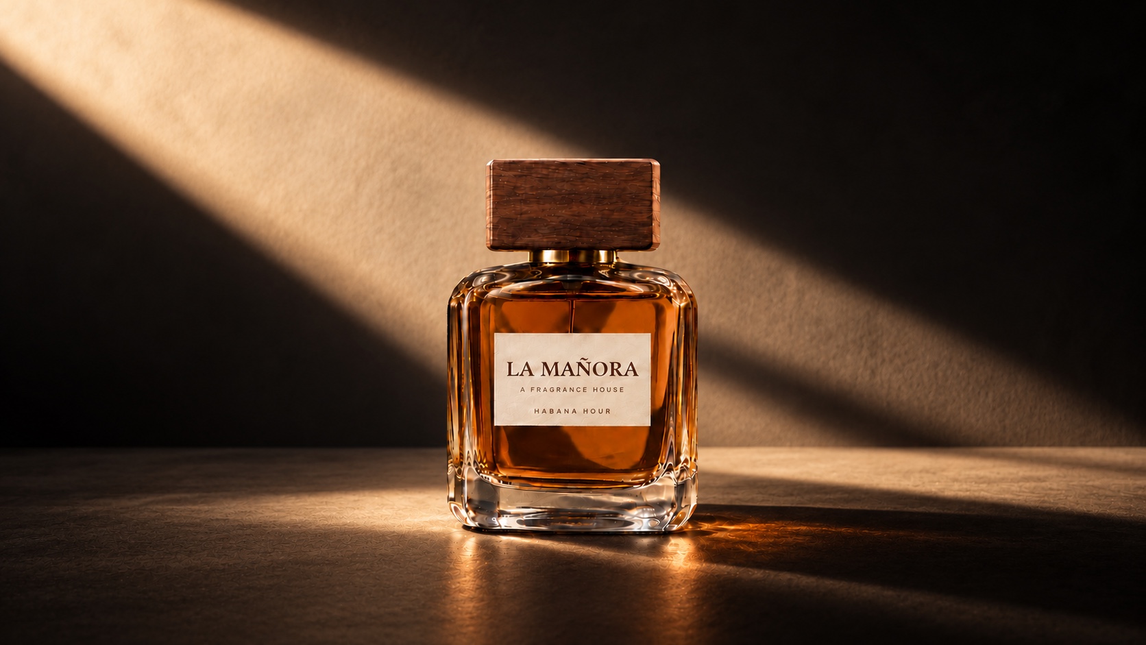 La Mañora Habana Hour perfume, amber glass with a walnut cap and cream label